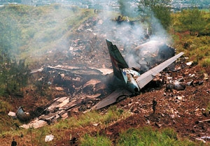 The smoldering wreckage of Flight 251, which crossed the Stygian ferry.